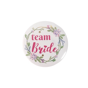 Floral Team Bride tinplate badge for bachelorette parties with pink lettering on white