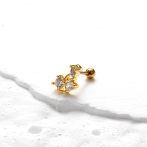 Detail of gold butterfly screw back earring with sparkling clear cubic zirconia stones