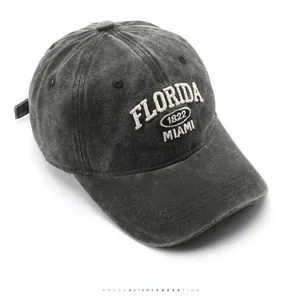 Top view of charcoal gray vintage washed baseball cap with Florida 1822 embroidery detail