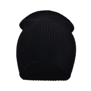Detailed close-up showing the fine ribbed knit texture of this thick black winter beanie