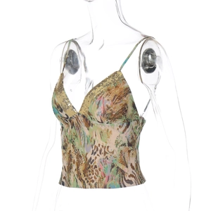Detail of leopard print camisole featuring V-neckline with shimmering sequin trim