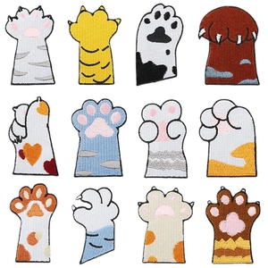 Set of 12 cartoon cat paw embroidery patches in various colors and patterns