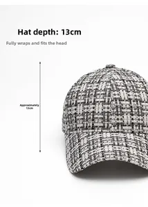 Detail showing the 13cm depth design and black and white plaid tweed texture on baseball cap