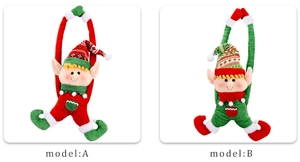 Detail of Model A and B plush Christmas elves featuring snowflake embroidery and knit caps