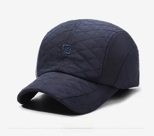 Close-up of quilted navy baseball cap featuring Narason embroidery and diamond patterns