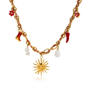 Detail of gold chain necklace with colorful woven cord and multi-pendant ocean charms