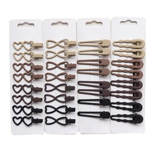 32-piece set of minimalist brown matte hair clips in four geometric shapes and earthy tones
