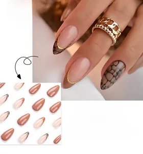 Detailed view of almond shape press-on nails in chocolate brown and snakeskin art patterns