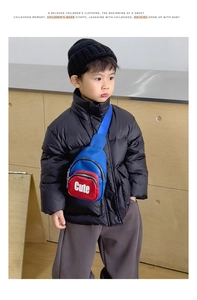 Detail of blue and red children's chest bag with 'Cute' text worn with sports outfit