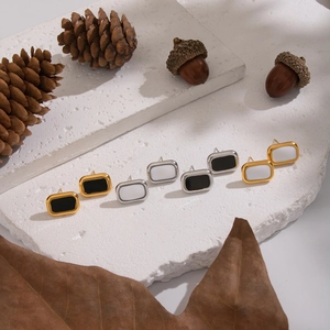 Classic rectangle stud earrings in gold and silver finishes with black and white stones