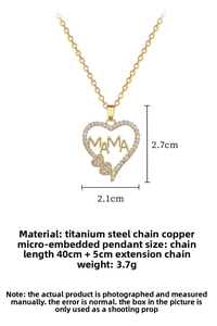 Detailed view of gold MAMA heart pendant with sparkling cubic zirconia on titanium chain