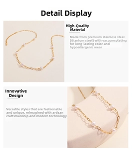 Detail of 18K gold plated stainless steel necklace with round white pearls
