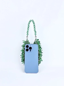 Handmade green faceted acrylic beaded handbag for women featuring a woven handle
