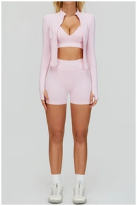 Détails de l'ensemble de yoga côtelé rose avec brassière et veste à passe-pouces