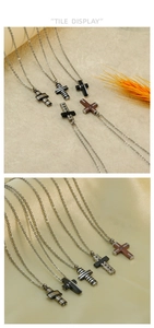 Detail display of five titanium steel cross necklaces in black, silver, and wood grain textures