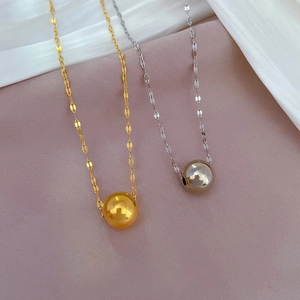 Titanium steel necklaces with lucky bead pendants in gold and silver finish