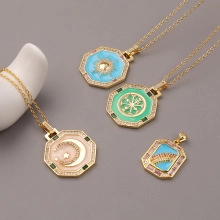 Detail of 18K gold religious Virgin Mary necklaces with colorful enamel celestial patterns