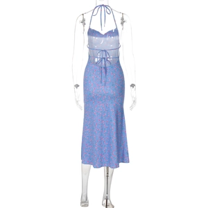 Detail of floral halter dress featuring criss-cross back ties and open back design