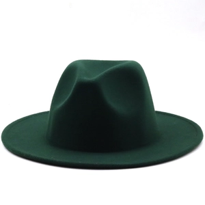 Detail of the high-quality dark green felt texture on this vintage jazz fedora hat