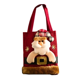 Christmas Santa gift bag in red faux linen with plush details and gold snowflake accents