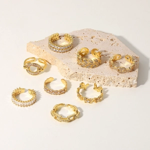 Set of 8 vintage 18K gold plated geometric rings with zircon inlay and open band design
