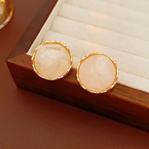 French vintage round wrinkled earrings with marble texture and gold metal frame