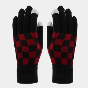 Detail of red and black checkered knit gloves with grey touchscreen conductive fingertips