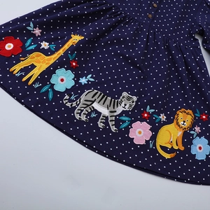 Navy blue girls long sleeve dress with white polka dots and animal embroidery details