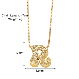 Detail of 12mm gold letter R pendant with zircon stones and 47cm chain dimensions