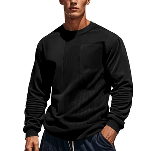 Men's black waffle textured sweatshirt with crew neck and chest pocket on white background