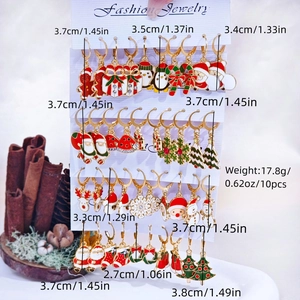 Detailed view of 10 pairs Christmas earrings set featuring Santa, snowman and reindeer designs