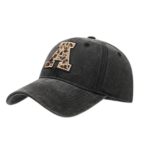 Vintage washed black baseball cap featuring a large leopard print letter A patch embroidery