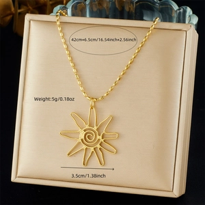 Detail of gold sun pendant necklace with dimensions and weight on jewelry display