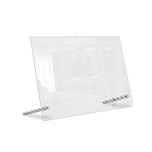 Close-up of clear acrylic weekly planner with metal stands and weekly to do list sections