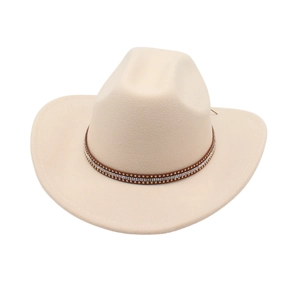 Close-up of beige wool cowboy hat featuring a brown leather band with gold studs and rhinestones