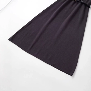 Fashionable dark grey knitted A-line midi dress with slim black leather belt