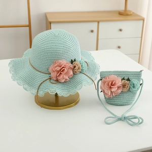 Summer mint green straw hat and matching floral bag set for girls with wavy brim