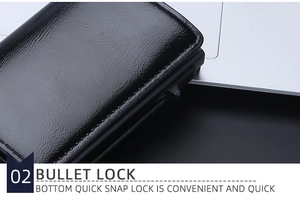Detailed macro view of black leather wallet with automatic bullet lock ejector mechanism