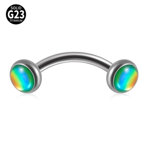 Macro shot of G23 titanium curved barbell with iridescent colorful beads for piercings