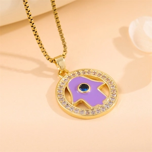 Golden round necklace with purple Hamsa Hand pendant and sparkling zircon stones