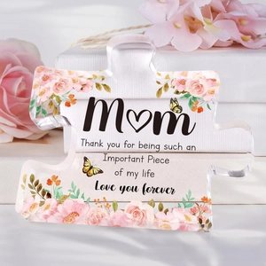 Detail of puzzle-shaped acrylic keepsake with UV printed pink roses and Mom greeting