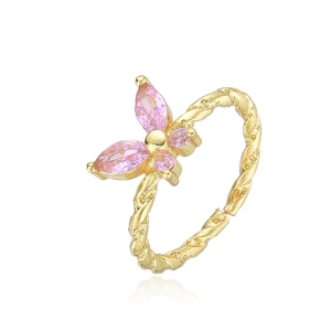 Gold twist band ring with pink marquise zircon butterfly and soft shadow reflection