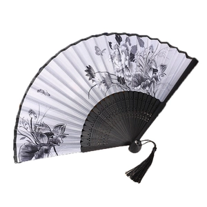 Classic Chinese folding fan with ink lotus painting and decorative black silk tassel