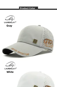 Detail view of quick-dry baseball caps in grey and white with laser-cut vents