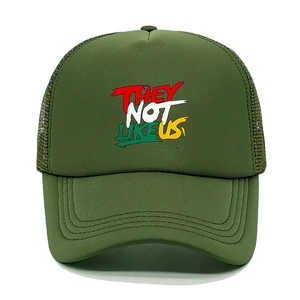 Detail of army green trucker hat with they not like us foam print and mesh back