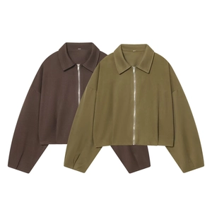 Detail showing smooth fabric texture and metallic zipper of the pilot jacket set