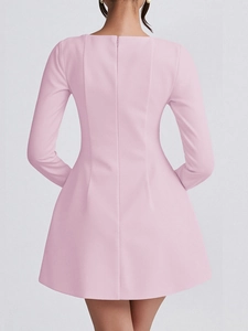 Detailed back view of pink long-sleeve A-line mini dress with invisible zipper closure