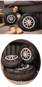 Detail showing 40cm and 60cm plush car tire pillows with realistic wheel hub textures