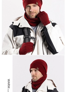 Detail of red winter knit set with thermal lining, gloves with grip, and neck warmer