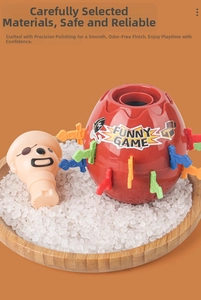 Close-up of pirate barrel game with colorful daggers on a wooden tray with white beads